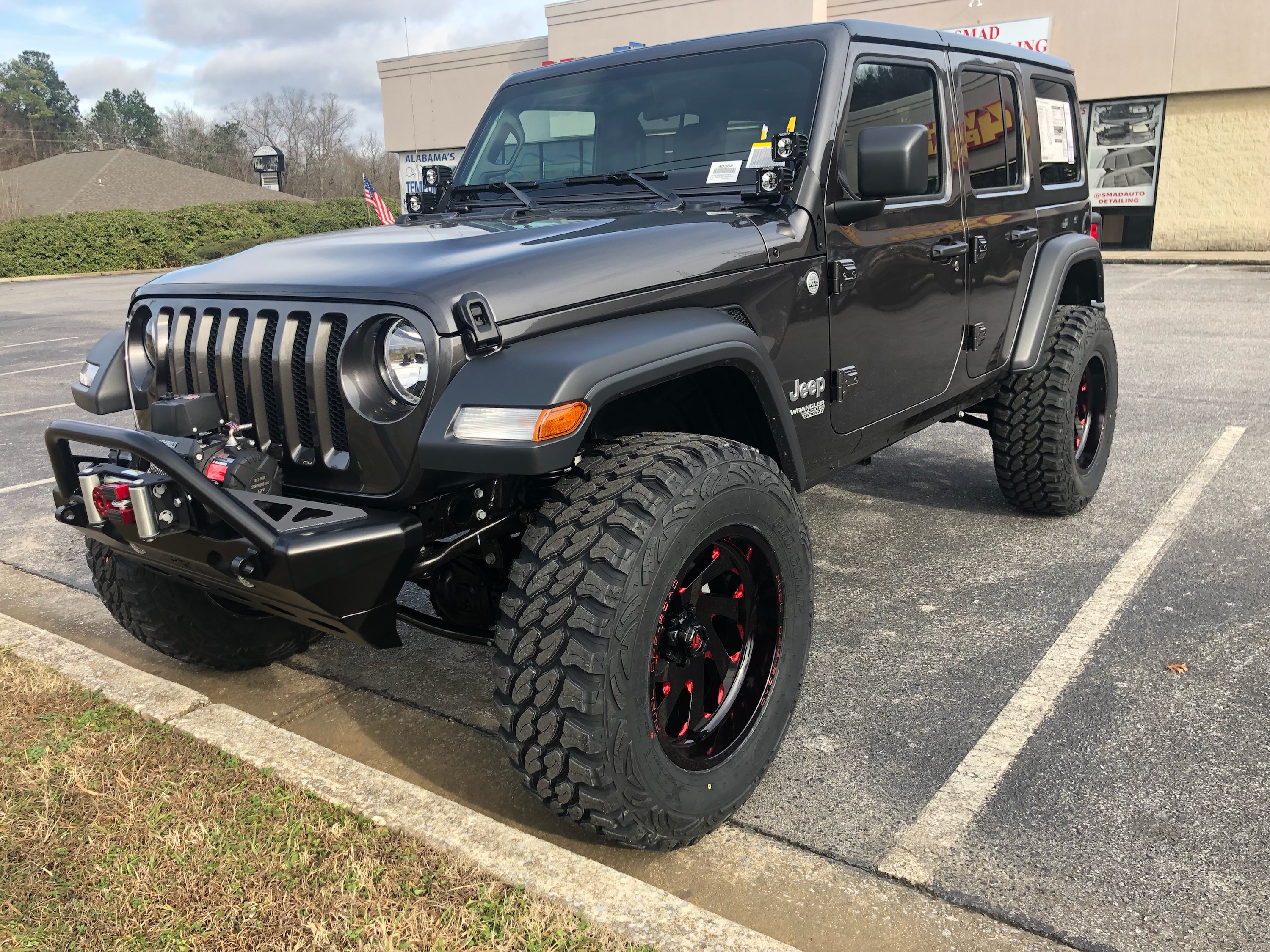 lifted JK Wrangler 2014 Dune color with Atlas bumpers from DSI